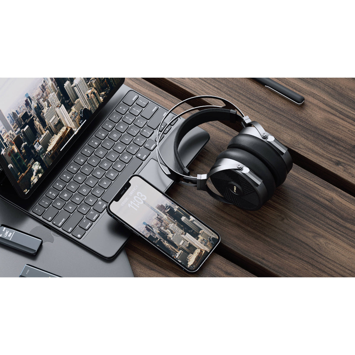 FiiO FT5 wired headphones with in-ear design and black ear tips, featuring inline remote and microphone for hands-free calls.