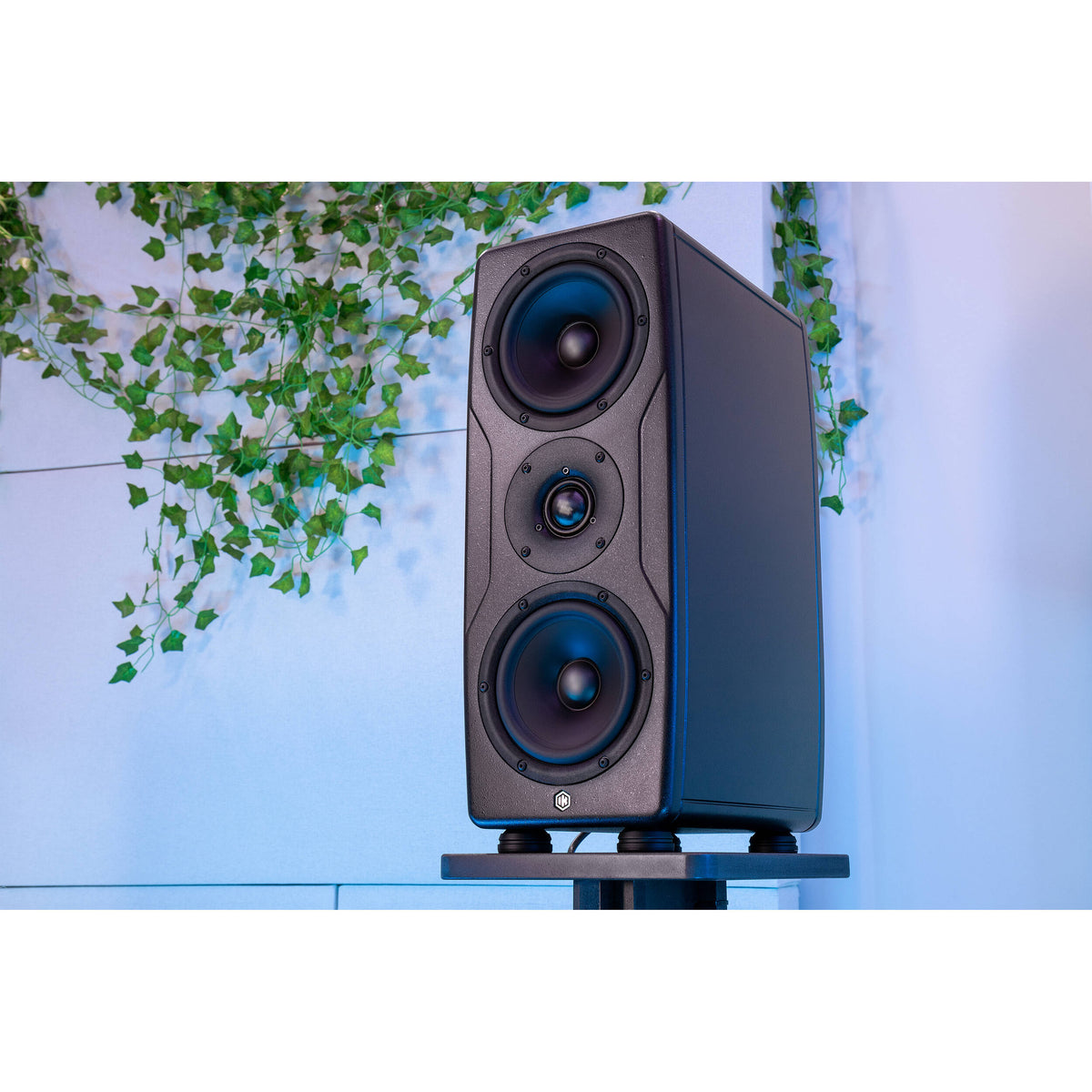 IK Multimedia iLoud Precision MTM MK2 active nearfield monitors with black finish and speaker grille, designed for professional audio.