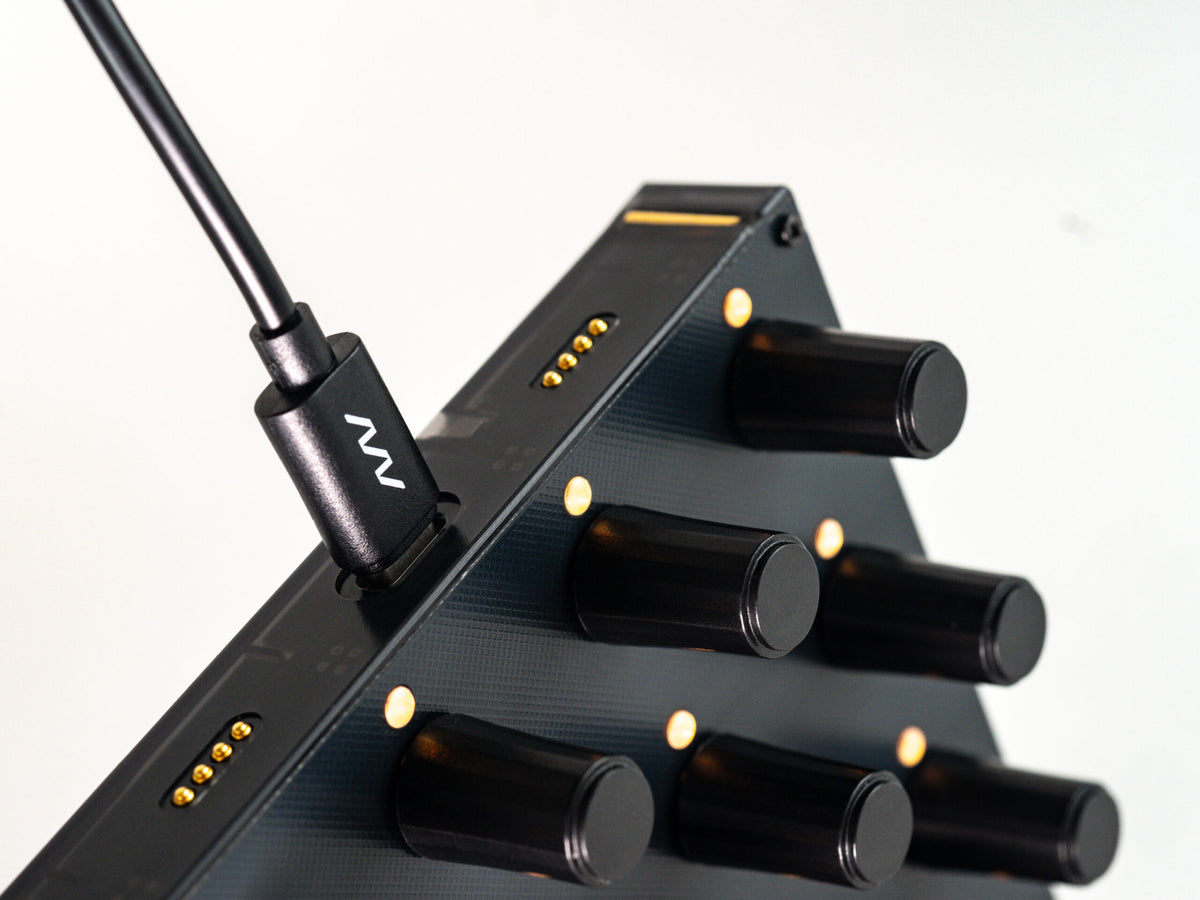 Close-up of the Intech Studio EN16 Detent MIDI controller from Series 3, showing detailed control knobs and interface features.