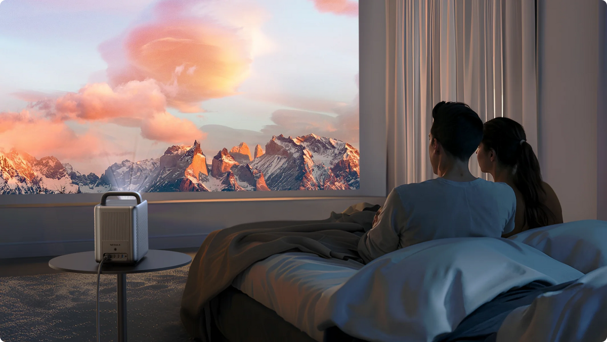 Nebula Cosmos 4K SE projector with sleek design, lens, and control buttons visible on a white background.