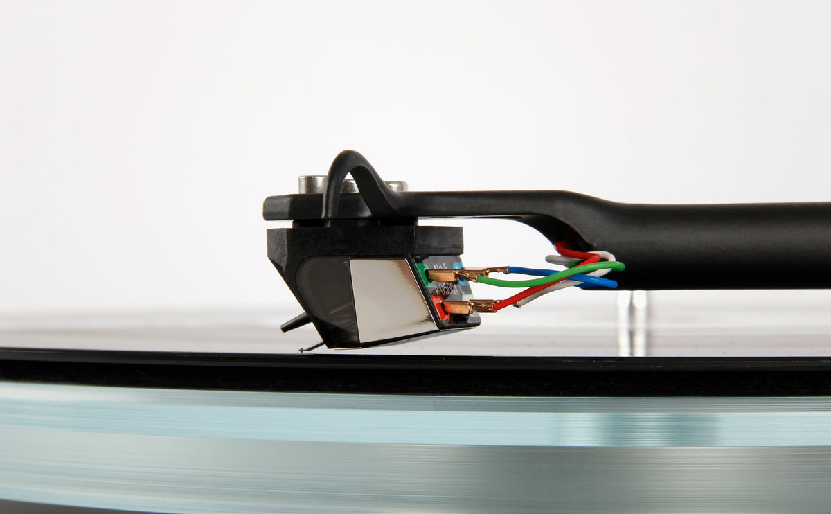 Rega ND5 turntable cartridge with detailed stylus and housing, designed for high-quality audio playback on turntables.