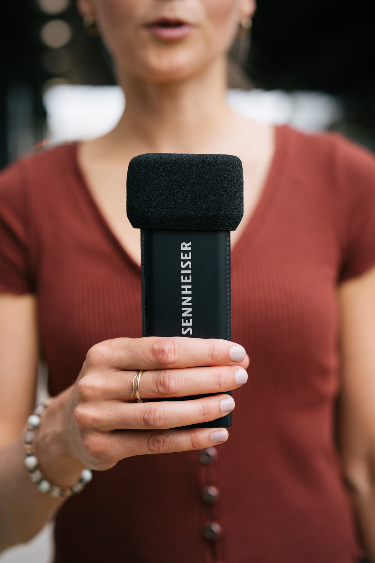 Sennheiser Profile Wireless Creator microphone system with sleek black body and compact design for professional audio recording.